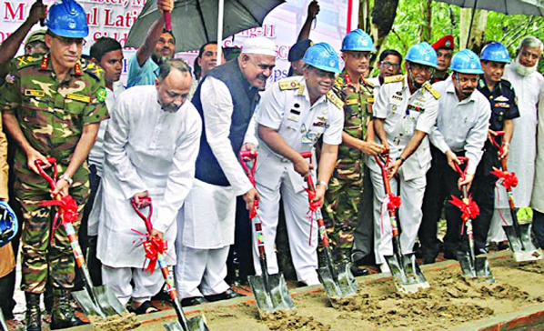 Shipping Minister M Shajahan Khan along with others laying the foundation stone of Patenga Container Terminal (PTC) at Chittagong Sea Port on Friday.