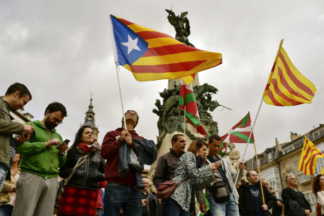 Pro independence supporters wave "estelada" or pro independence flags during a rally in support for the secession of the Catalonia region from Spain, in Vitoria on Saturday.