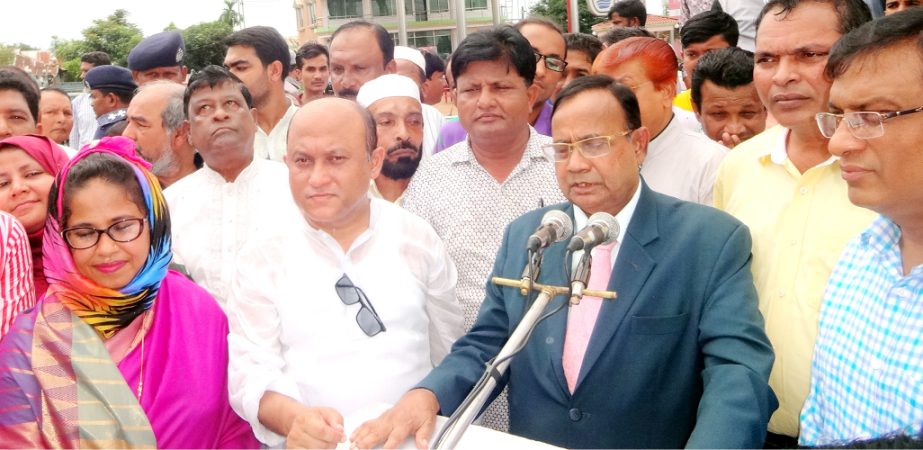 Railway Minister Mujibul Haque addressing a gathering at Ramu during his visit to see Railway line building project site on Saturday.