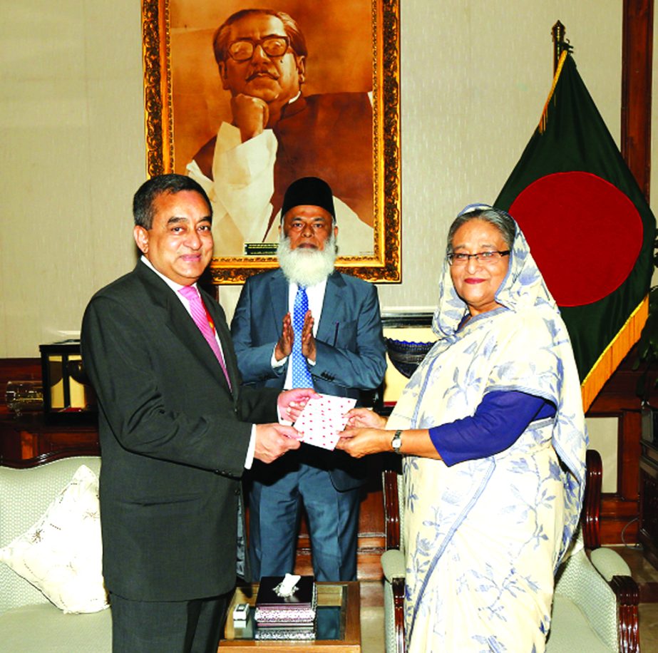 Sayeed H Chowdhury, Chairman of ONE Bank Limited, handing over a cheque of Tk 3 crore to Prime Minister Sheikh Hasina at Ganabhaban recently as a donation for flood affected people across the country.