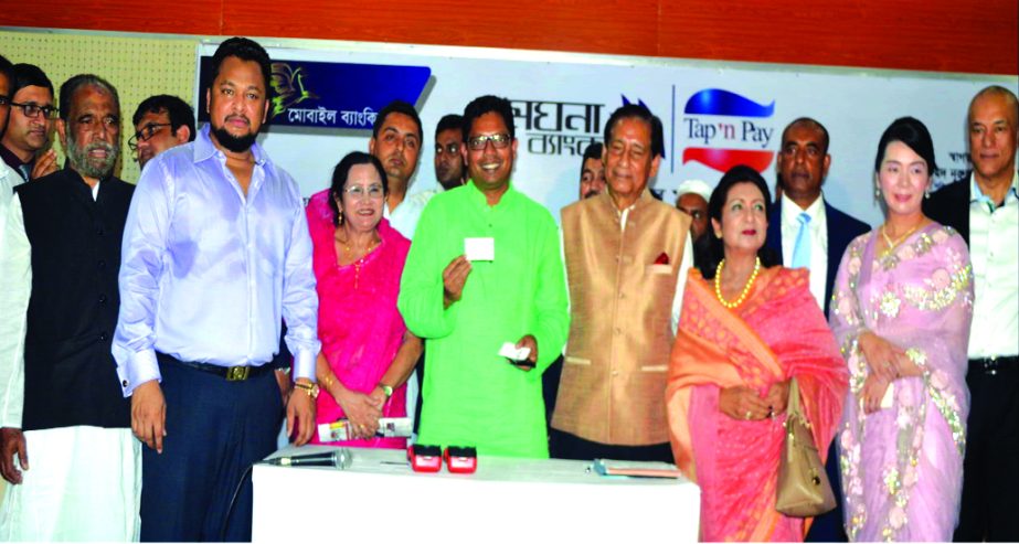 State Minister for ICT Zunaid Ahmed Palak MP, inaugurating the Transaction Service of Meghna Bank Tap 'n Pay, (a Mobile Financial Service), at Begam Rokeya Auditorium Mithapukur in Rangpur on Sunday. HN Ashequr Rahman MP, Chairman, Nurul Amin, Managing D