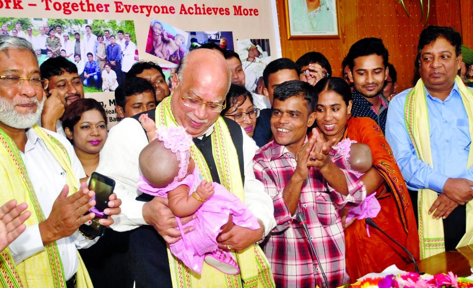 Health and Family Welfare Minister Md Nasim was present at the farewell ceremony of 10-month old two conjoined babies separated successfully at the DMCH on Sunday.