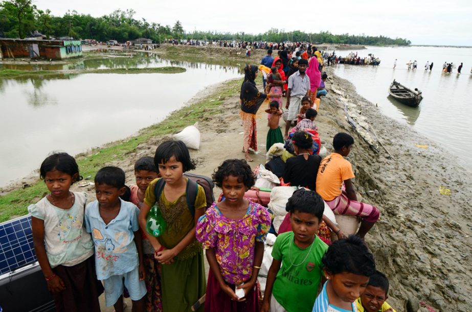 Rohingya children anxiously waiting at char areas in Teknaf on Sunday.