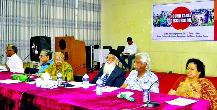 Former Chief Election Commissioner Justice Abdur Rouf, among others, at a roundtable organised by 'Sarbadaliya Oikya' at the Engineers Institute in the city on Monday to express solidarity for Rohingya refugees.
