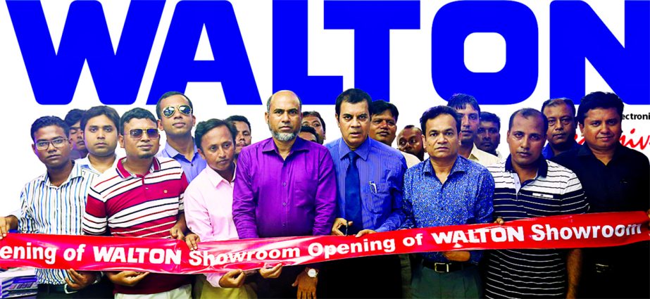 Film actor Ilias Kanchan, inaugurating an Exclusive Walton Showroom at Bauphal in Patuakhali recently as company Brand Ambassador. Md. Abdullah Al Mahmud Zaman, Bauphal UNO, Md. Amdadul Haque Sarker, Executive Director (Marketing) and Md. Humayun Kabir, E