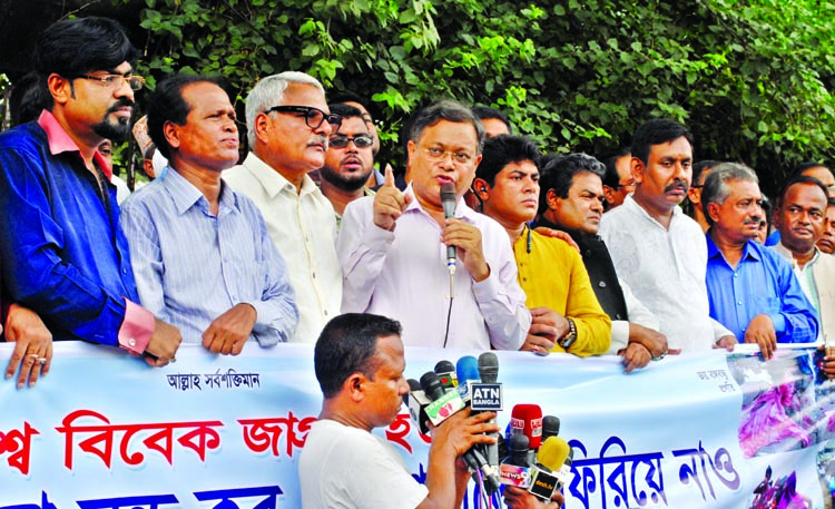 Bangladesh Swdhinata Parishad formed a human chain in front of Jatiya Press Club yesterday protesting killing of Muslim Rohingyas in Myanmar.