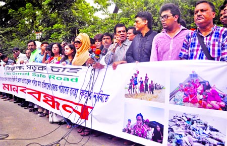 'Nirapad Sarak Chai' formed a human chain in front of the Jatiya Press Club on Thursday with a call to stop genocide in Myanmar.