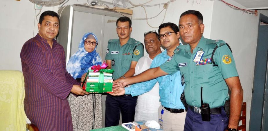 Chittagong Metropolitan Police and Community Policing Committee distributing books in Chittagong Medical College, Omar Gani MES College and Khaja Azmiri High School yesterday. Deputy Police Commissioner (North) Md. Abdul Waris,Senior Asst. Police Commissi