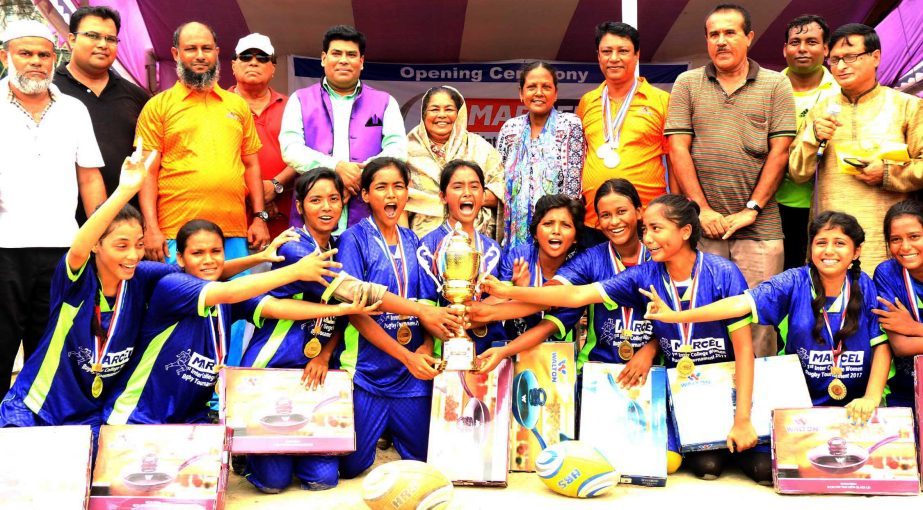 Members of Narayanganj College, the champions of the Marcel 2nd Inter-College Women's Rugby Competition with the guests and officials pose for a photo session at the Paltan Maidan on Tuesday.