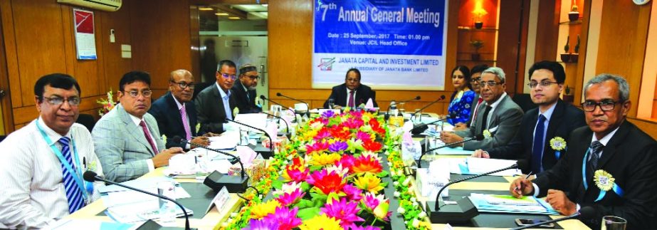 Shaikh Md. Wahid-uz-Zaman, Chairman of the Janata Bank and Janata Capital and Investment Limited, presiding over its 6th and 7th AGM at the investment office of the bank in Dhaka on Monday Md. Abdus Salam FCA, Managing Director of the bank and Dina Ahsan,