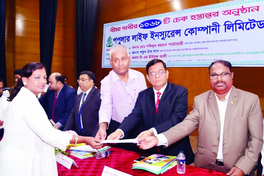 Popular Life Insurance Company Ltd handed over cheques for Tk 4,62, 57, 046 against 1068 claims at a ceremony at the Institution of Diploma Engineers of Bangladesh a ceremony on Monday. Md Shafiqur Rahman Patwary , Chairman, Insurance Development and