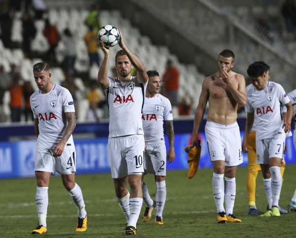 Tottenham's Harry Kane, who score three goals against APOEL holds the ball at the end of the Champions League Group H soccer match between APOEL Nicosia and Tottenham Hotspur at GSP stadium in Nicosia, Cyprus on Tuesday. Tottenham won 3-0.