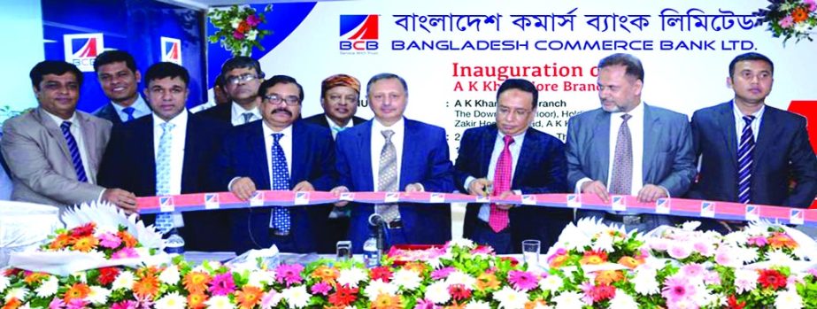 Engr. Rashid Ahmed Chowdhury, Chairman, Board of Directors of Bangladesh Commerce Bank Limited, inaugurating its 52nd Branch at AK Khan Crossing in Chittagong recently. Humayun Bokhteyar, EC Chairman, RQM Forkan, Managing Director of the bank and local bu