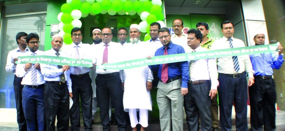 Md. Ali Haider Mortuza, Vice-President and Rajshahi Regional Head of National Bank Limited, inaugurating an ATM Booth at Dinajpur Branch on Wednesday. Md. ABM Sharafat Ullah Chowdhury, Rajshahi Regional VP and Md. Abdur Rahim, SAVP of the bank were presen