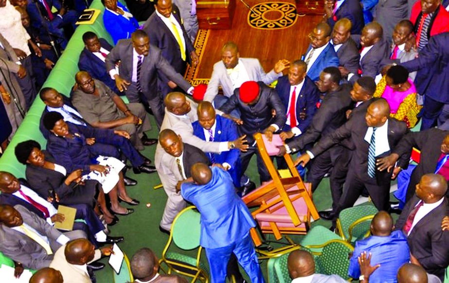 Ugandan lawmakers brawl in the Parliament in Kampala.