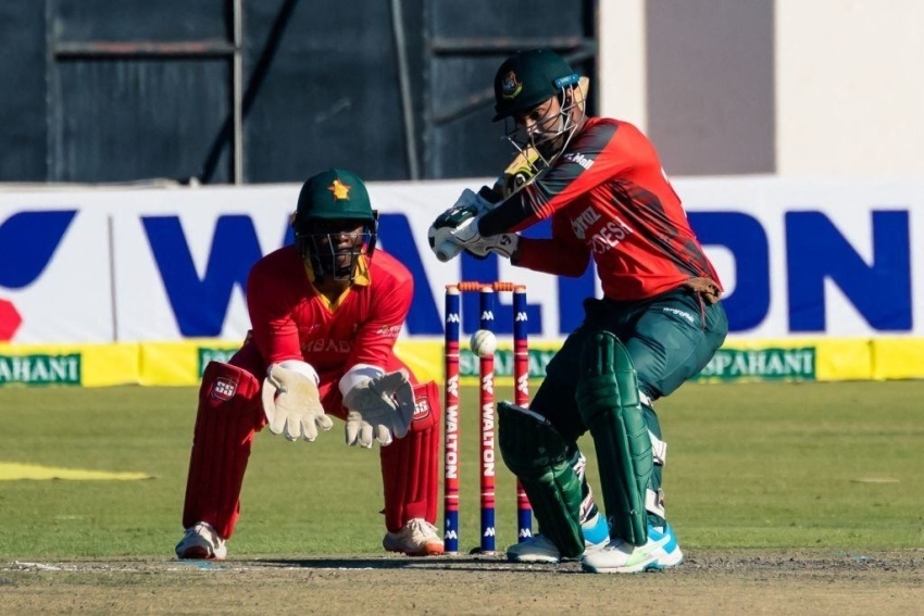 Litton Das (right) of Bangladesh plays a shot, while wicketkeeper Regis Chakabva of Zimbabwe watches during their second Twenty20 international match at Harare Sports Club Ground in Zimbabwe on Sunday. Litton top-scored with 56 runs. Agency photo