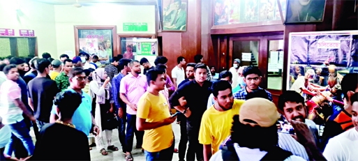 Film-lovers swarm in city's Modhumita Hall on Sunday for tickets to watch just released movie named 'Hawa'.
