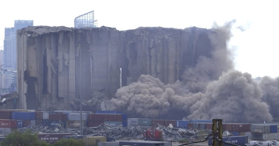 This frame grab from video shows part of the silos collapsing, in the port of Beirut, Lebanon, Sunday, July 31, 2022.
