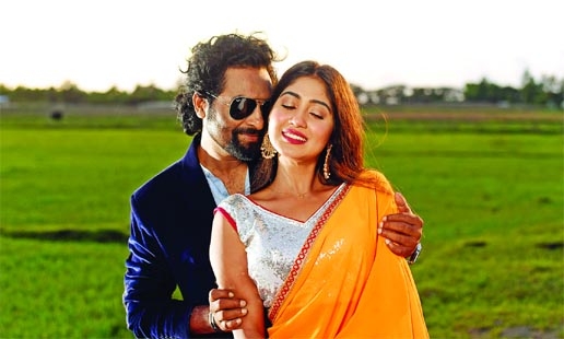 Kamal Khan and Sushmita Sinha in a scene from music video of Kona-Omy rendered song ‘Ami Jodi Pakhi Hotam’