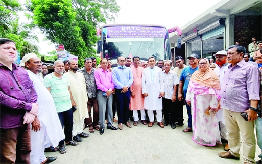BETAGI (Barguna): A B M Golum Kabir, Mayor, Betagi Pourashava poses for a photo session after inaugurating BRTC Bus Service from Betagi- Khulna Route on Wednesday.