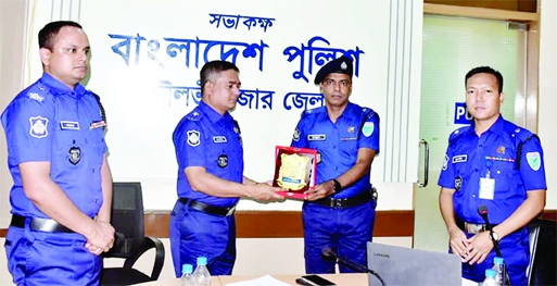 MOULVIBAZAR : ASI Mahbubul Alam of Moulvibazar Sadar Model Police Station receives the best ASI of Moulvibazar district award at Police Headquarters on Thursday.