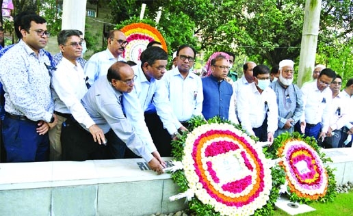 Local Government Minister Tajul Islam pays tributes to Sheikh Kamal by placing floral wreaths at the latter's grave at Banani Graveyard in the city on Friday marking his 73rd birth anniversary.