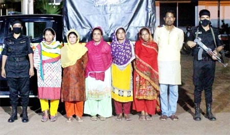 RAB detains members of women trafficking gang during raid at Siddhirganj thana in Narayanganj on Friday.