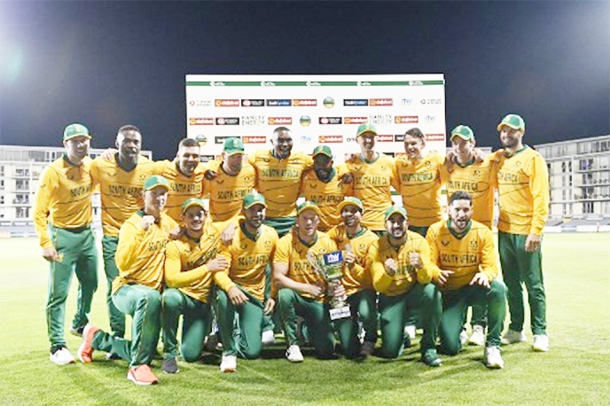 South Africa players celebrate with the T20I series trophy after their second match against Ireland in Bristol on Friday.