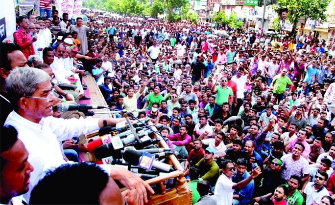 BNP Secretary General Mirza Fakhrul Islam Alamgir addresses a JCD rally in front of Nayapaltan area on Saturday protesting the killing of its Bhola district unit president Noor-e-Alam.