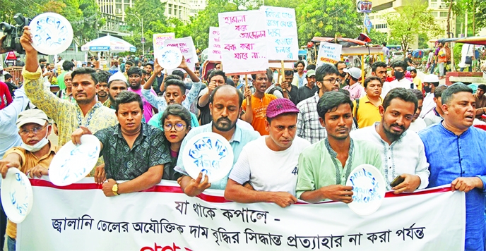 Agitating public-students bring out a rally in city’s Shahbagh area on Friday protesting illogical fuel price hike .