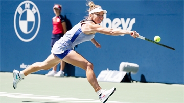 Romania's Simona Halep stretches to reach a shot from United States' Coco Gauff during Women's National Bank Open tennis match at Sobeys Stadium USA on Friday.