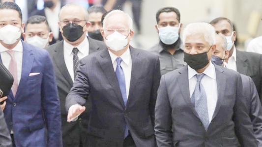 Former Malaysian Prime Minister Najib Razak arrives at the Federal Court, in Putrajaya, Malaysia on Monday.