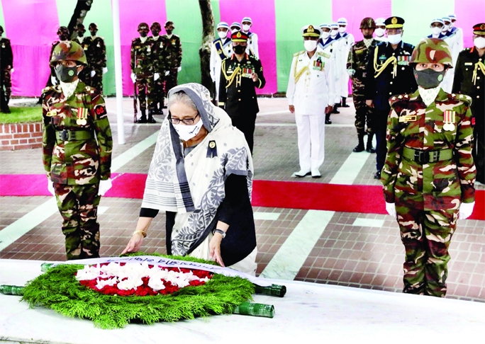Prime Minister Sheikh Hasina places wreaths at the mausoleum of Father of the Nation Bangabandhu Sheikh Mujibur Rahman paying homage to the great leader to mark the National Mourning Day on Monday.