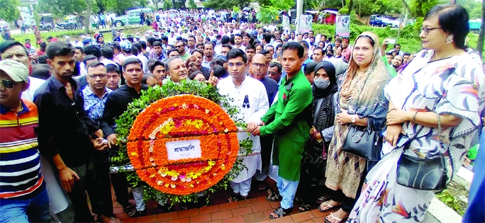 MADHUKHALI (Faridpur): High officials of Upazila Administration place wreath at the mural of Bangabandhu to mark the National Mourning Day on Monday.