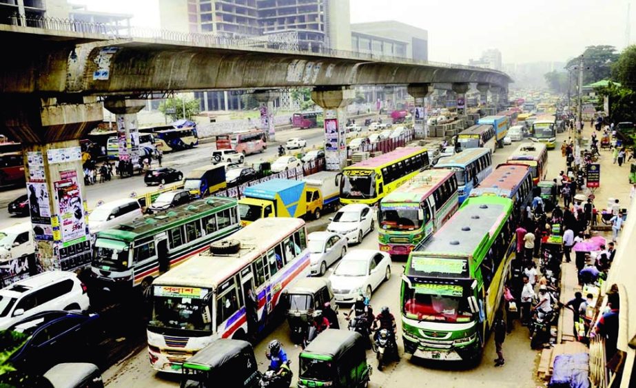 Huge traffic gridlock created across the capital city due to ruling Awami League's rally in front of the Institution of Engineers at Ramna on Wednesday. NN photo