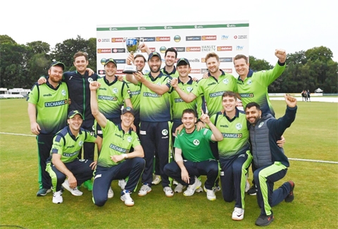 Ireland players celebrate with the T20I series trophy after beating Afghanistan in the fifth match in Stormont on Wednesday.