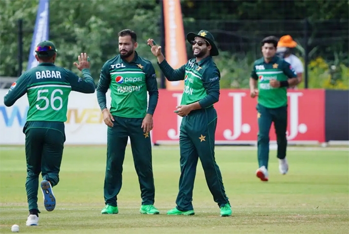 Pakistan players get together after a Mohammad Nawaz strikes against Netherlands in their second One Day International at Rotterdam in Netherlands on Thursday.