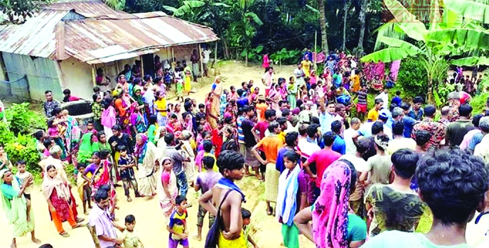 People gathered hearing the news of four female tea garden workers death in a landslip at a tea garden in Sreemangal upazila of Moulvibazar.