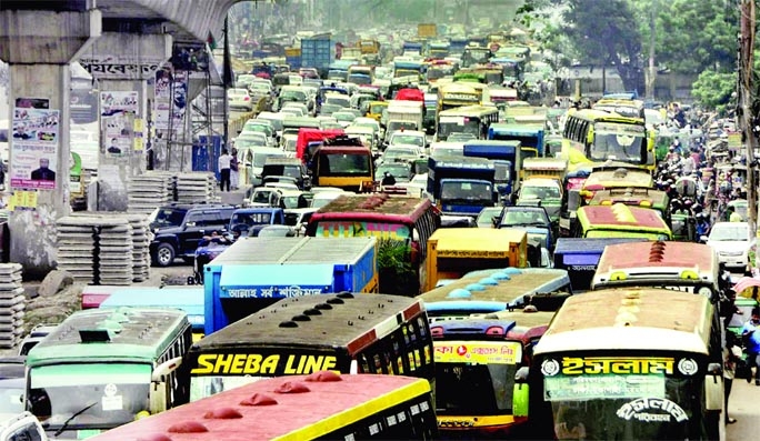 Hundreds of vehicles get clogged in heavy gridlock in city's Airport area on Sunday. As a result, commuters suffered a lot and normal traffic movement hampered.