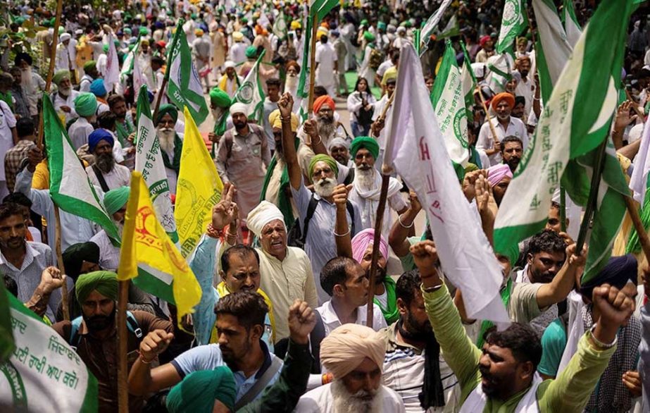 Farmers attend a Maha Panchayat or grand village council meeting as part of a farmers' protest in New Delhi on Monday. Agency photo