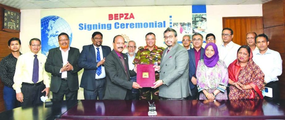 Ali Reza Mazid, a member of Bangladesh Export Processing Zone Authority (BEPZA), and Nafees Muntasir Khan, managing director of Trendy Textiles Ltd, signed an investment agreement at BEPZA Complex in Dhaka on Tuesday.