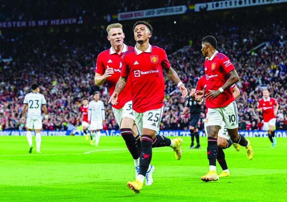 Manchester United's Jadon Sancho (front) celebrates after scoring during the English Premier League match between Manchester United and Liverpool in Manchester, Britain on Monday. Agency photo