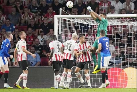 Rangers' goalkeeper Jon McLaughlin (top right) saves during a Champions League playoff second leg soccer match between PSV Eindhoven and Rangers, at the Philips stadium in Eindhoven, Netherlands on Wednesday.