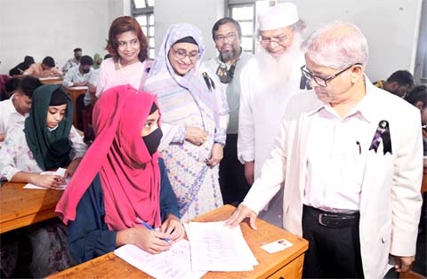 VC of Dhaka University Prof Dr. Akhtaruzzaman visits an examination center of Commerce Unit of first year honours of affiliated seven colleges under DU at Begum Badrunnesa Government Mahila College in the city on Friday.