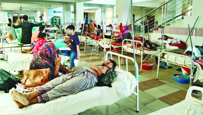 Patients with dengue infections are seen taking treatment at the Mugda Medical College & Hospital in the capital on Friday amid rising mosquito borne disease.