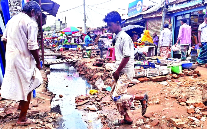 MURADNAGAR (Cumilla): The dilapidated Muradnagar Upazila Bazar Road needs immediate repair as the work of drains construction has been going on for the five years which causes a great sufferings to the locals. The snap was taken on Saturday.