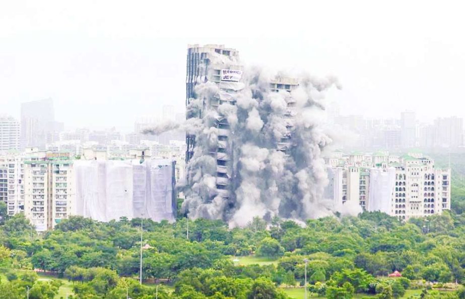 The Supertech Twin Towers collapse following a controlled demolition after the Supreme Court found them in violation of building norms, in Noida, India on Sunday. Agency photo