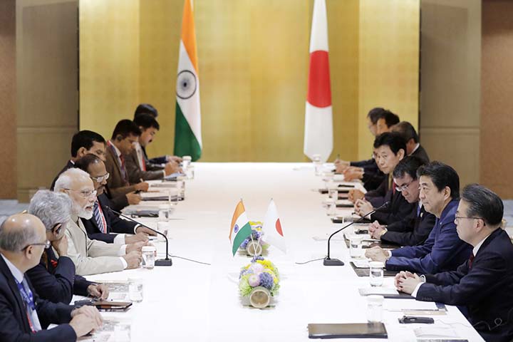 Indian Prime Minister Narendra Modi, third from left, speaks to his Japanese counterpart Shinzo Abe, second from right, during a bilateral meeting ahead of the G-20 Summit in Osaka, western Japan on Thursday.
