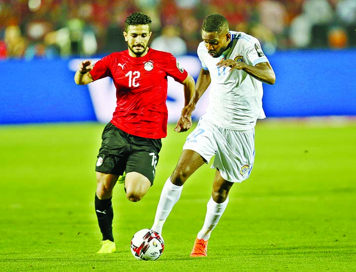 DR Congo's Cedric Bakambu (right) in action in front of Egypt's Ayman Ashraf during the group A soccer match between Egypt and DR Congo at the Africa Cup of Nations at Cairo International Stadium in Cairo, Egypt on Wednesday.