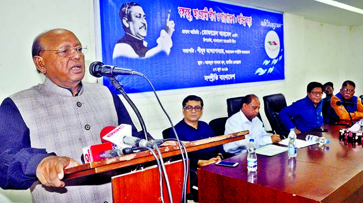 Presidium Member of Awami League Tofael Ahmed speaking at a discussion on 'Bangabandhu, Awami League and Bangladesh: Indifferent Soul' organised by Sampriti Bangladesh at the Jatiya Press Club on Thursday.